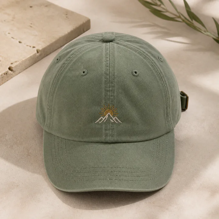 Sage cap embroidered with a tiny custom mountain symbol