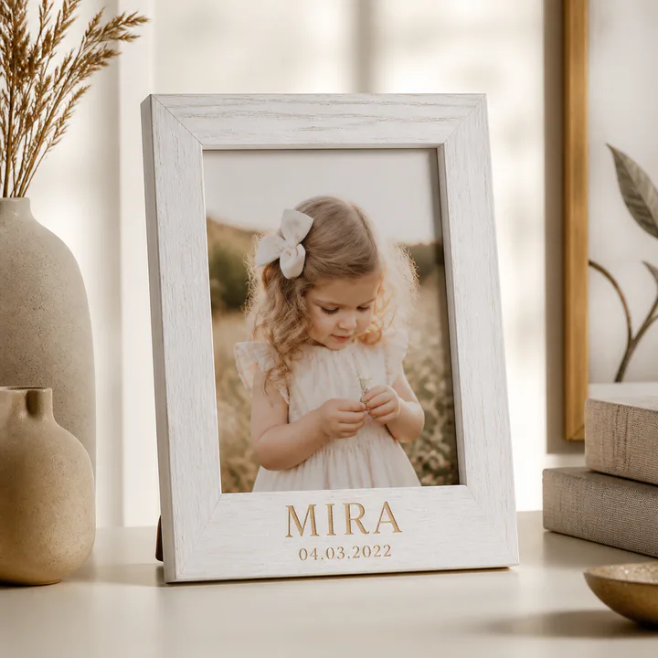 White wood photo frame personalized with a name and date